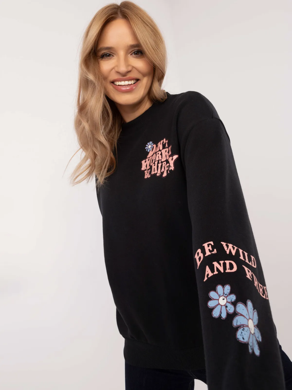 Oversize'owa bluza casualowa z kwiatowym nadrukiem - zdjęcie 1