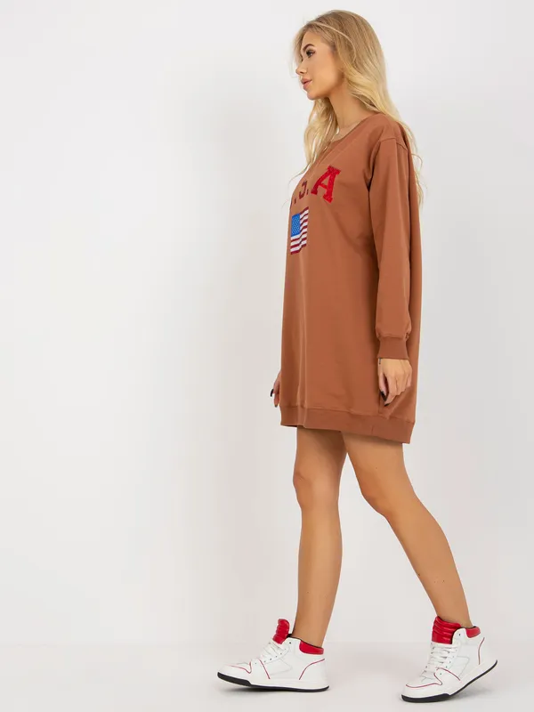 Ecru luźna bluza z nadrukiem i aplikacją z dżetów