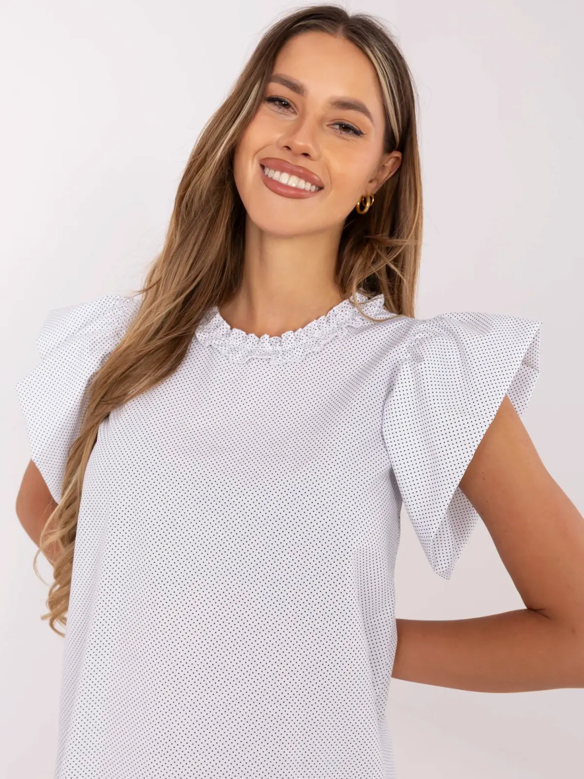 Krótka sukienka o kroju trapezowym z falbankami - zdjęcie 1