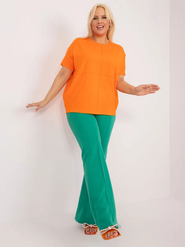 Casualowa bluzka oversize z ozdobnymi przeszyciami