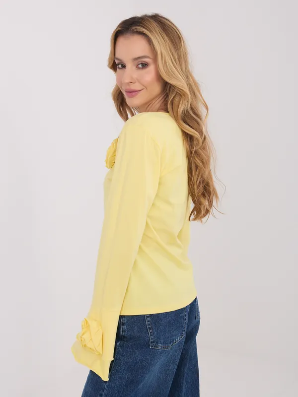 Bluzka z długim rękawem i aplikacjami róż