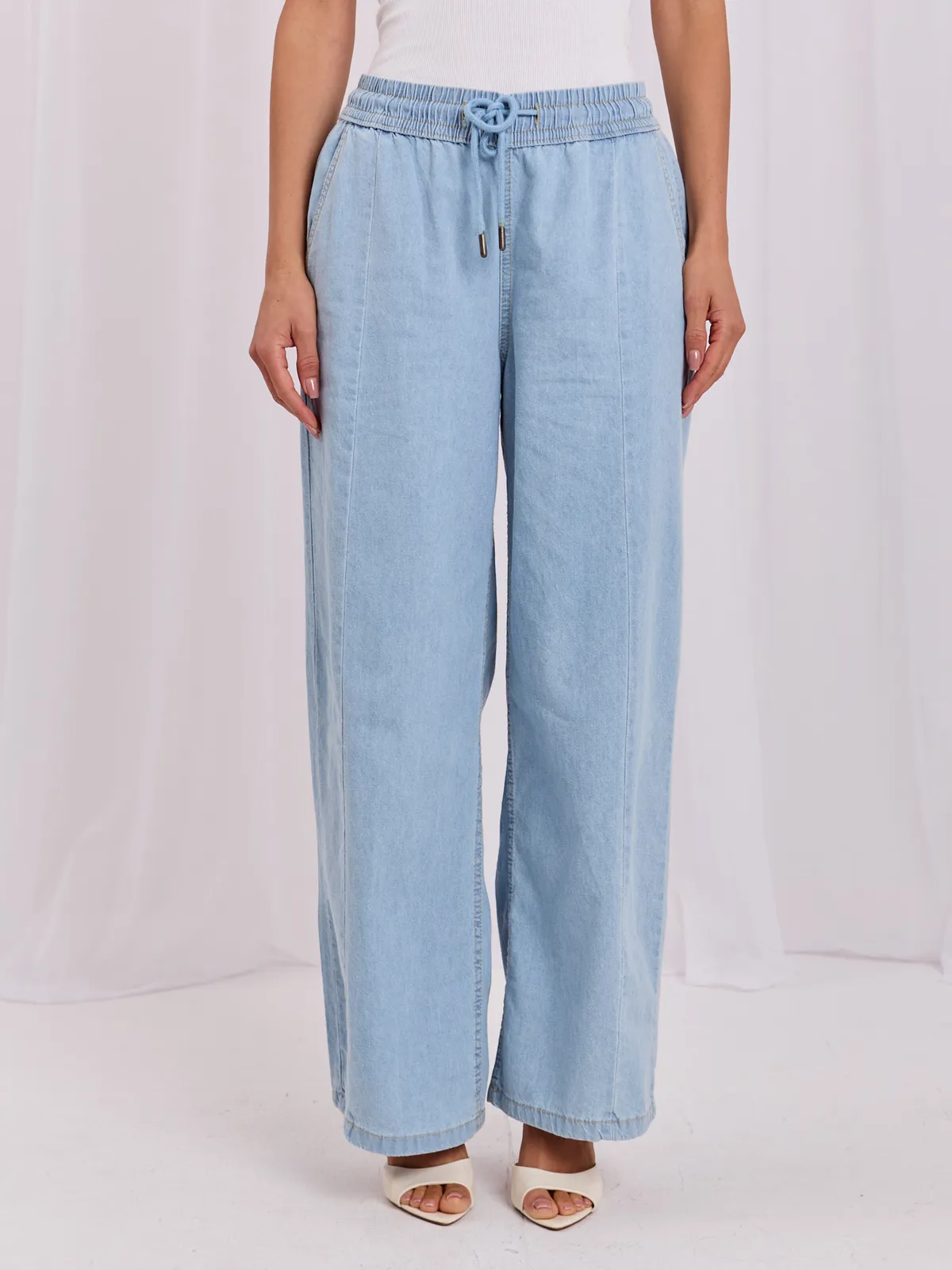 Luźne spodnie typu wide leg z wiązaniem - zdjęcie 1