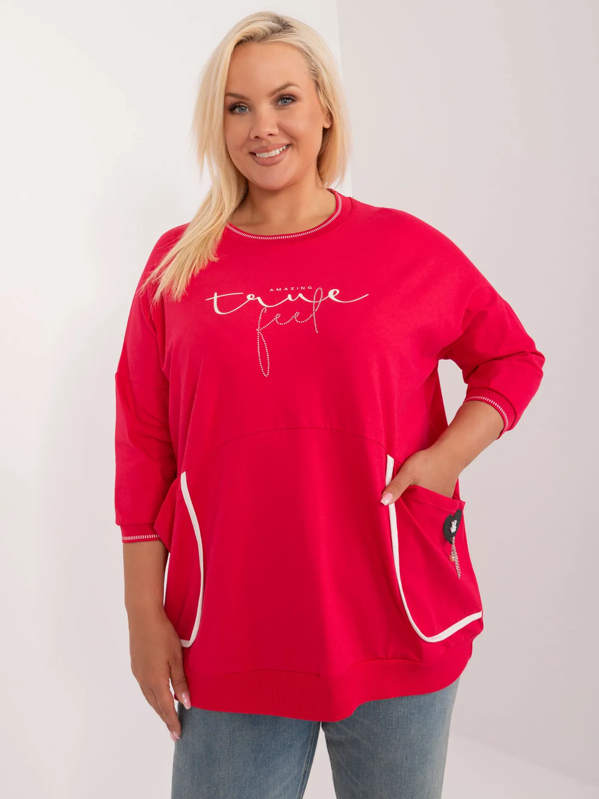 Casualowa bluza oversize z ozdobnymi kieszeniami i printem - zdjęcie 1