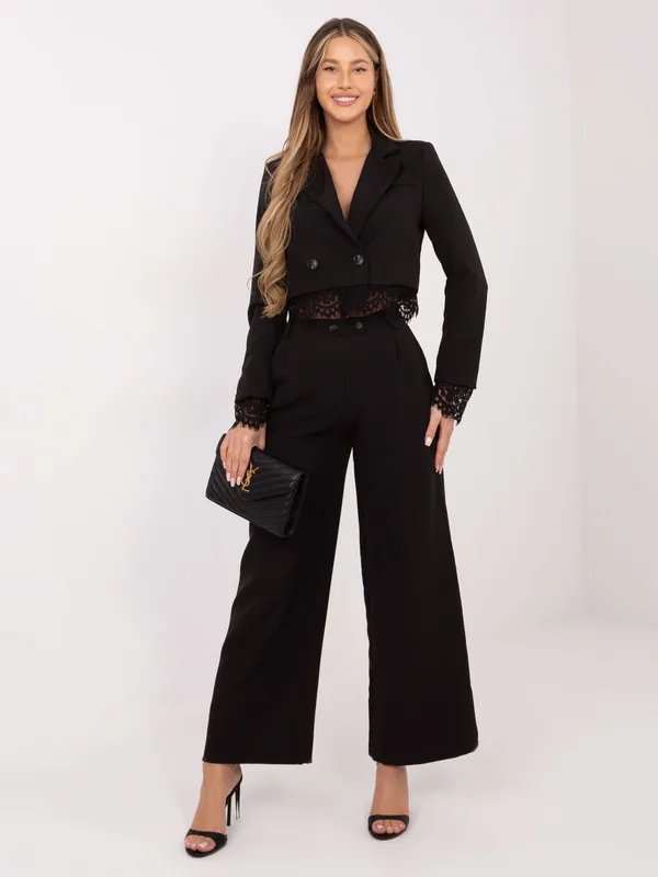 Eleganckie spodnie z wysokim stanem o kroju wide leg - widok 2