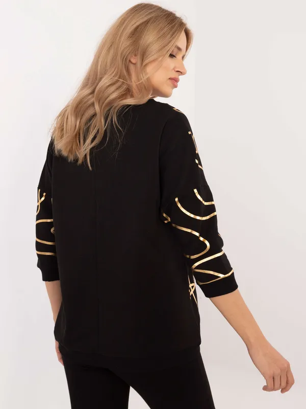 Bluza oversize z ozdobnym nadrukiem i cyrkoniami