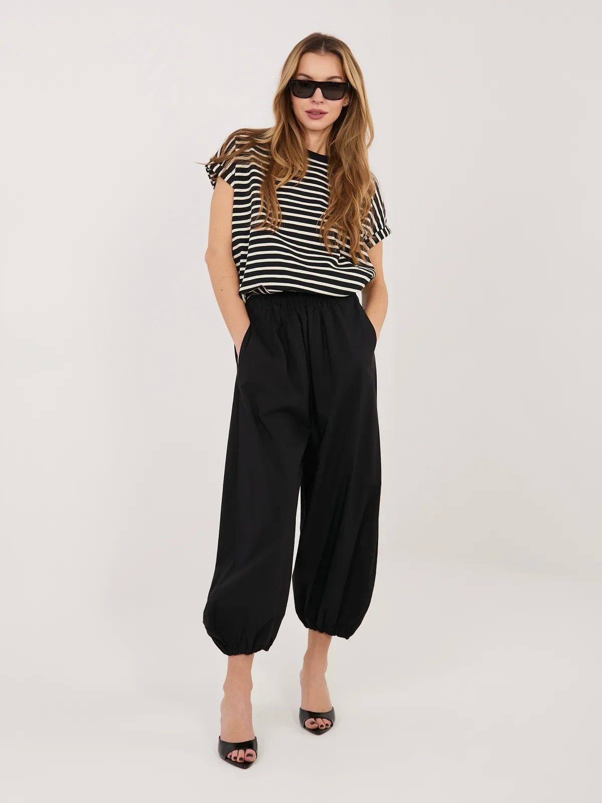 Luźne spodnie typu baggy ze ściągaczami - zdjęcie 1