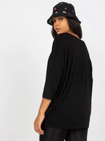 Biała codzienna bluzka plus size z dekoltem w serek