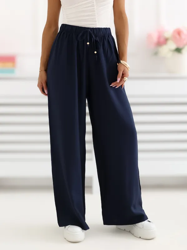 Luźne spodnie z wysokim stanem i wiązaniem - widok 2