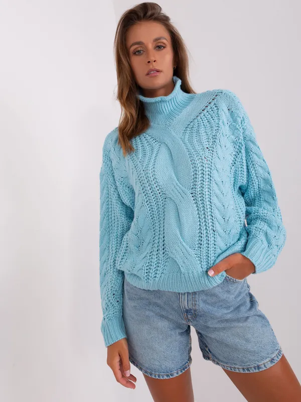 Ecru damski sweter oversize z warkoczami