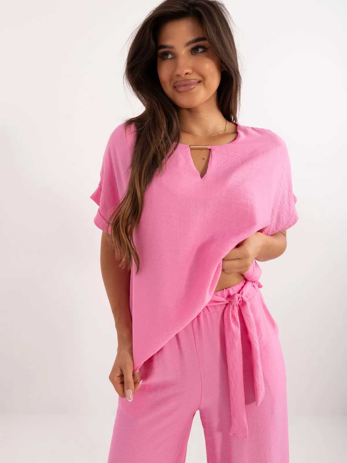 Dwuczęściowy komplet z bluzką oversize i spodniami - zdjęcie 1