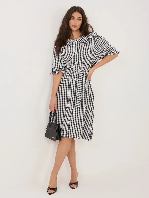 Elegancka sukienka z kołnierzem i wiązaniem w talii