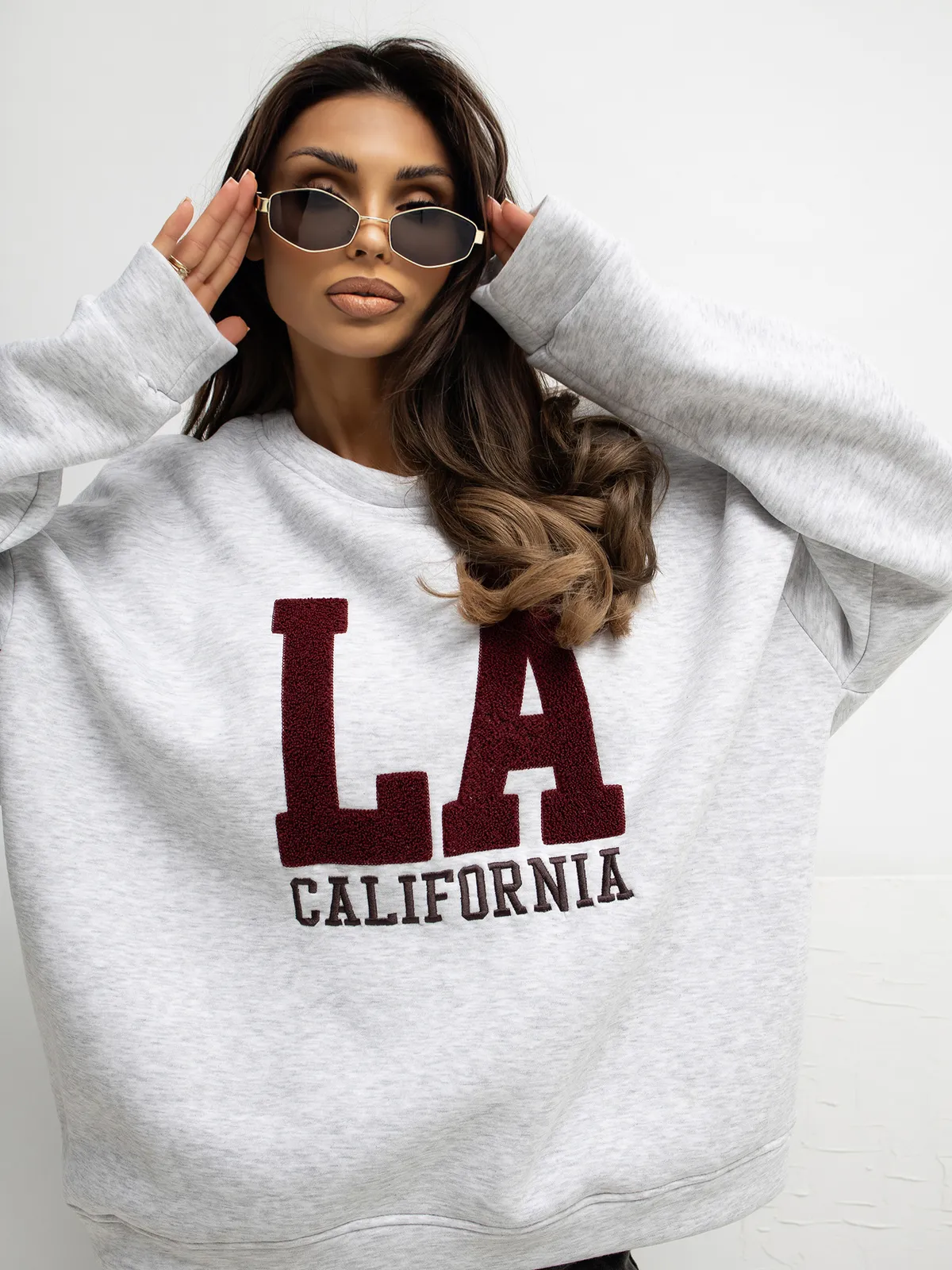 Bluza oversize z napisem w klimacie retro - zdjęcie 1