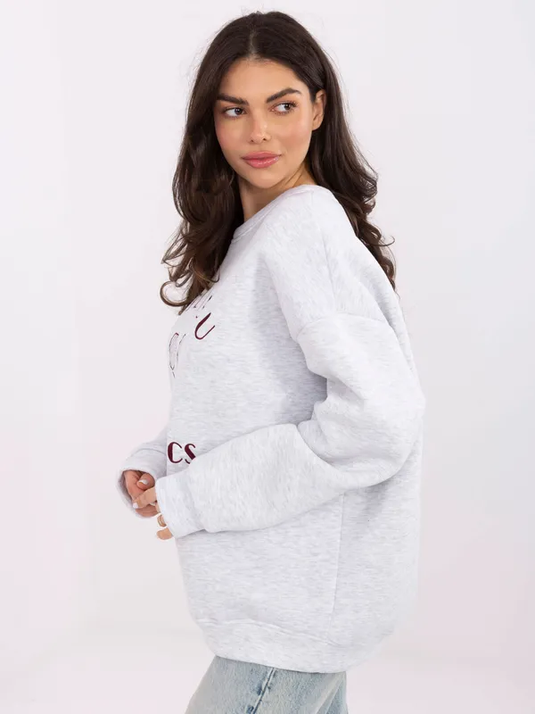 Bluza oversize z haftowanym motywem sportowym