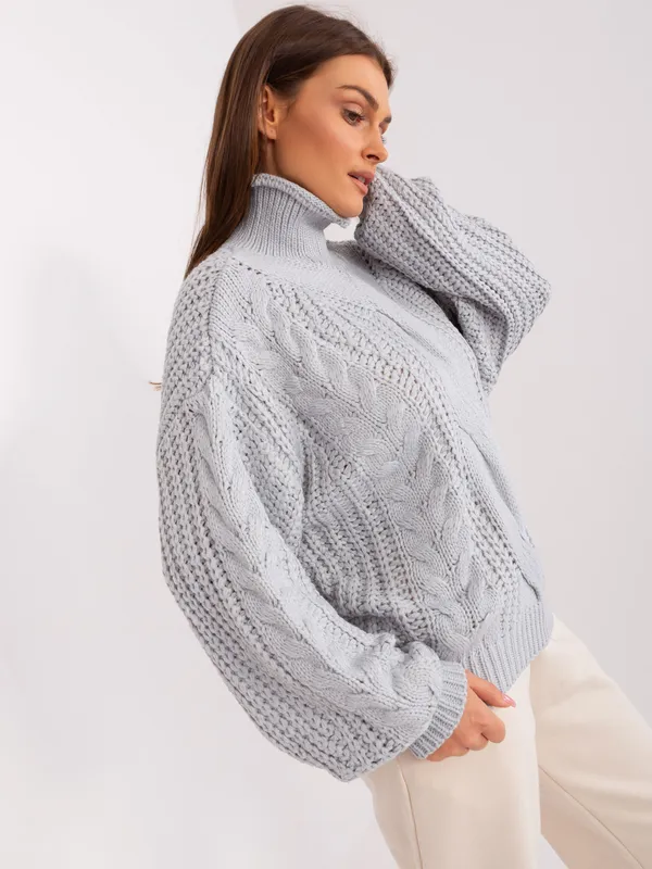 Ecru damski sweter oversize z warkoczami