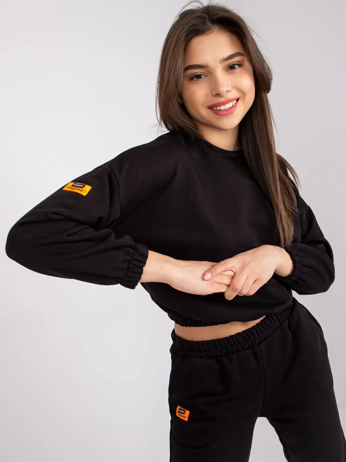 Dwuczęściowy komplet dresowy typu oversize ze ściągaczami - zdjęcie 1