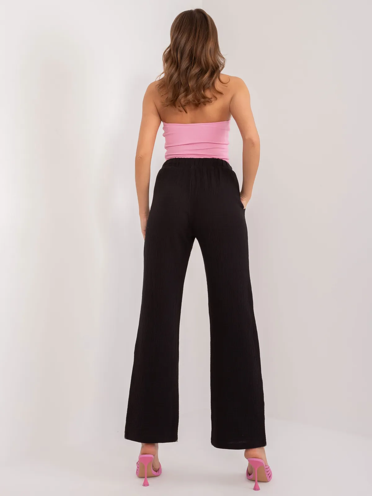 Luźne spodnie z wysokim stanem i wiązaniem - zdjęcie 1