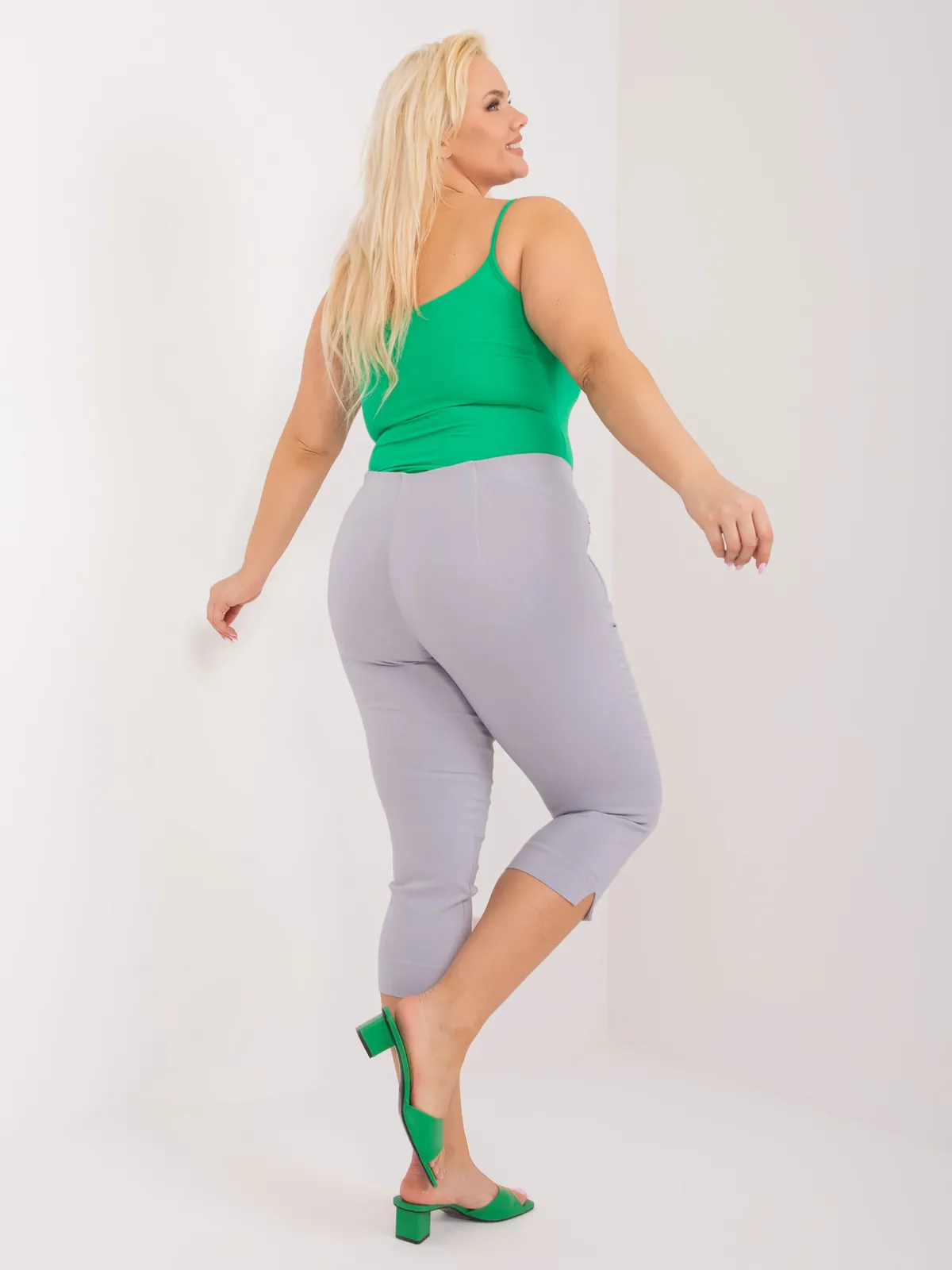 Wizytowe spodnie rybaczki z ozdobnymi suwakami - zdjęcie 1