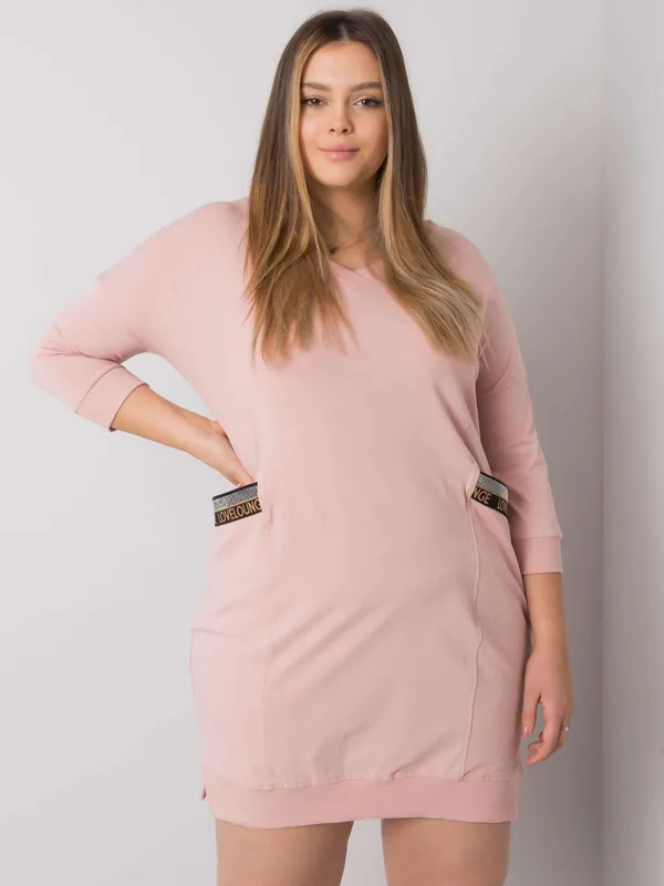 Sukienka sportowa oversize z ozdobnymi kieszeniami