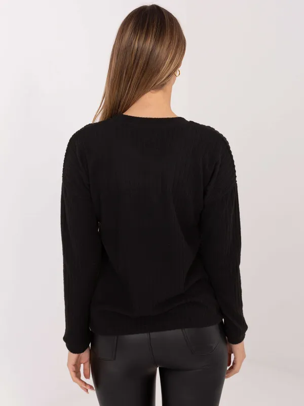 Casualowy sweter w prążki o kroju oversize