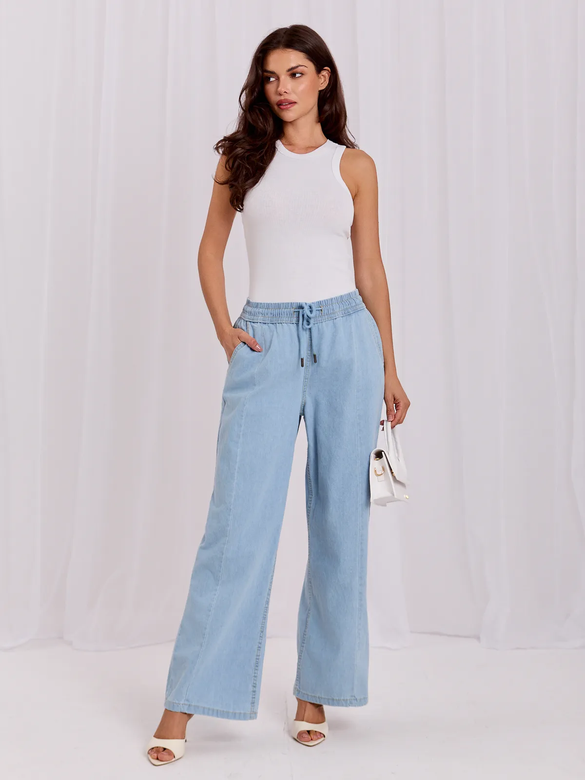 Luźne spodnie typu wide leg z wiązaniem - zdjęcie 4