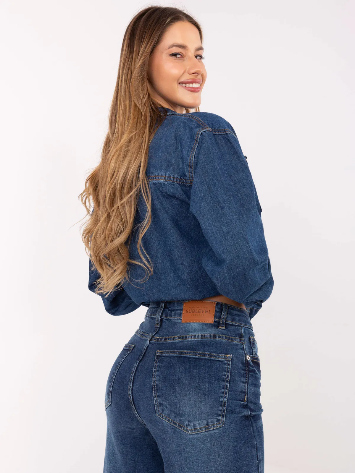Spodnie jeansowe o kroju wide leg - zdjęcie 3