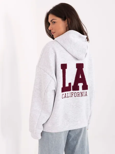 Bluza oversize z kapturem i wypukłym napisem