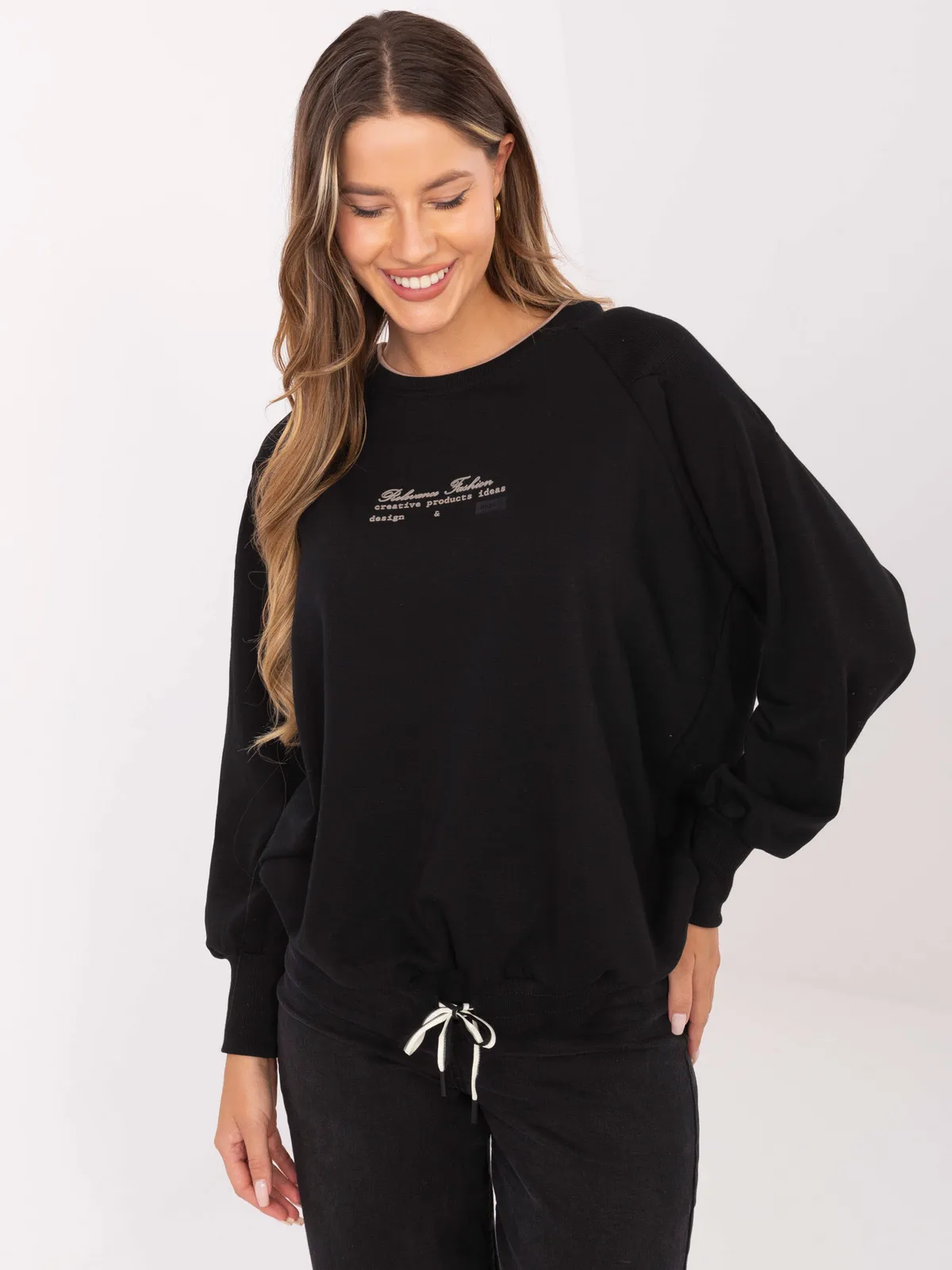 Bluza oversize z napisem i ściąganym dołem - zdjęcie 1