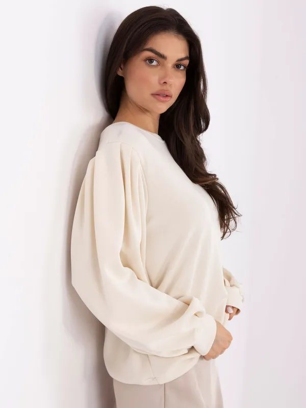 Bluza z bufkami w klimacie glamour