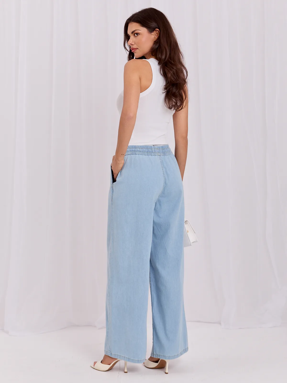 Luźne spodnie typu wide leg z wiązaniem - zdjęcie 2