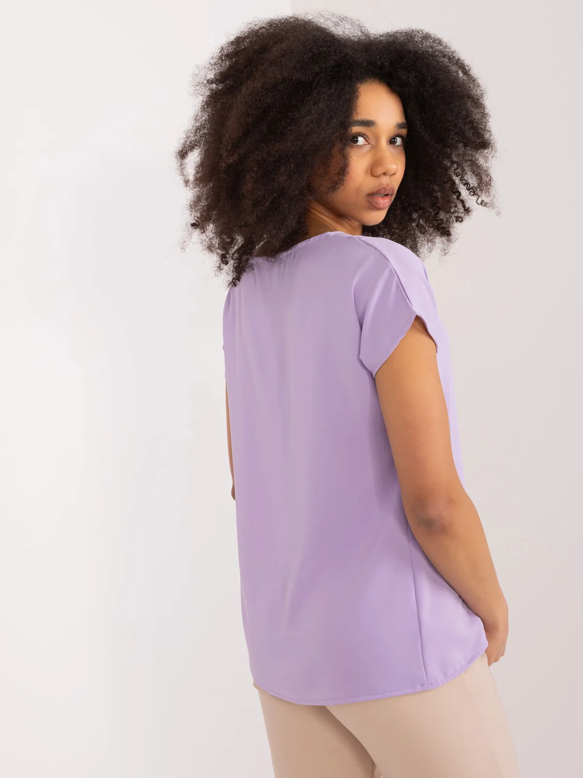 Casualowa bluzka z dekoltem w serek - zdjęcie 1