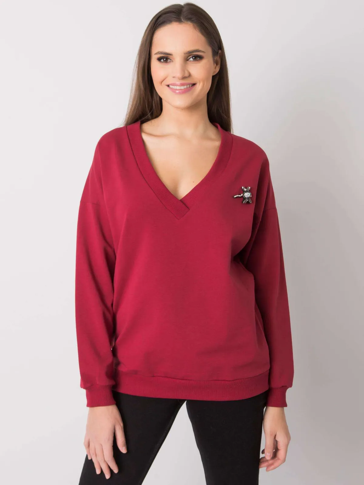 Casualowa bluza oversize z ozdobną broszką - zdjęcie 1