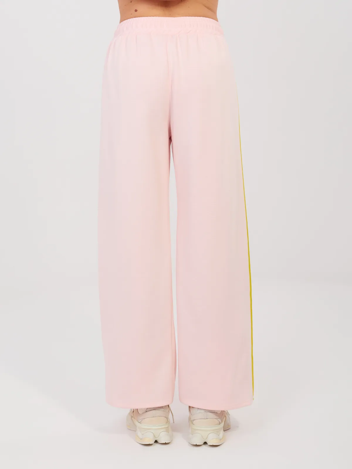 Dresowe spodnie o kroju wide leg z lampasem - zdjęcie 1