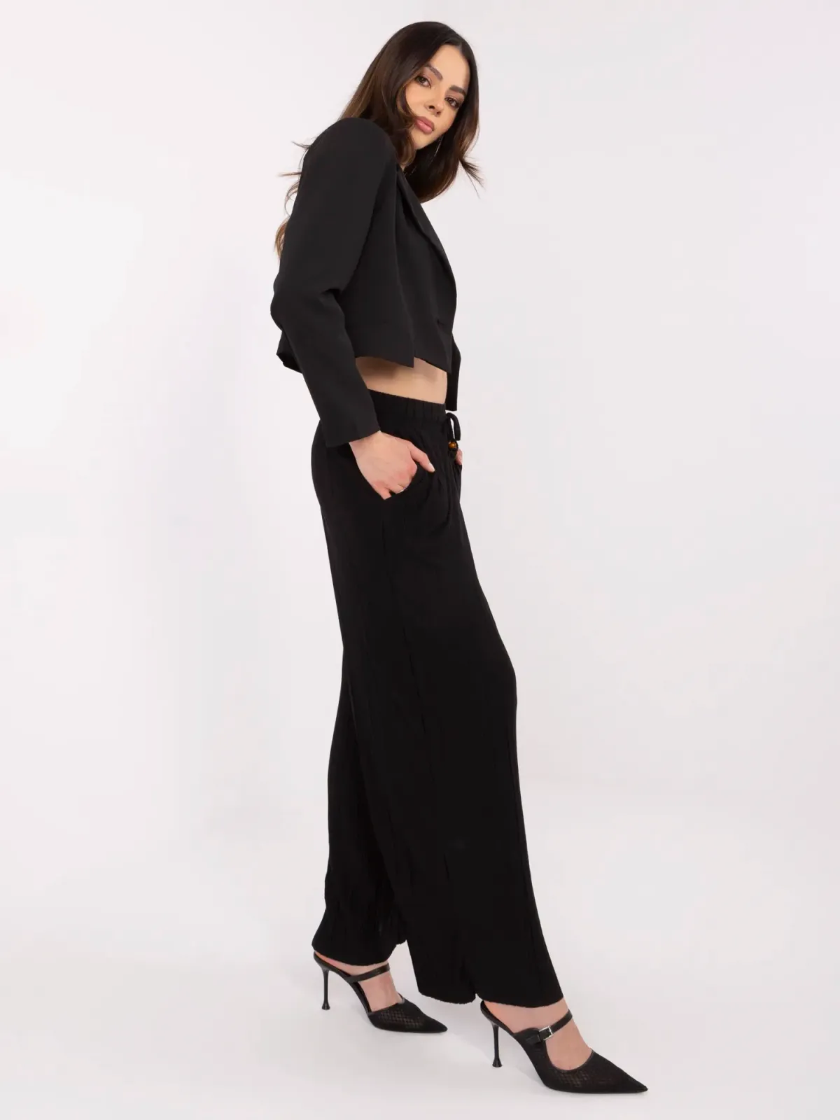 Plisowane spodnie palazzo o luźnym kroju - zdjęcie 1