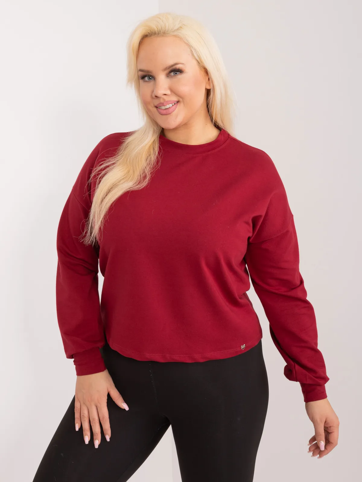 Jasnoróżowa gładka bluza plus size - zdjęcie 2
