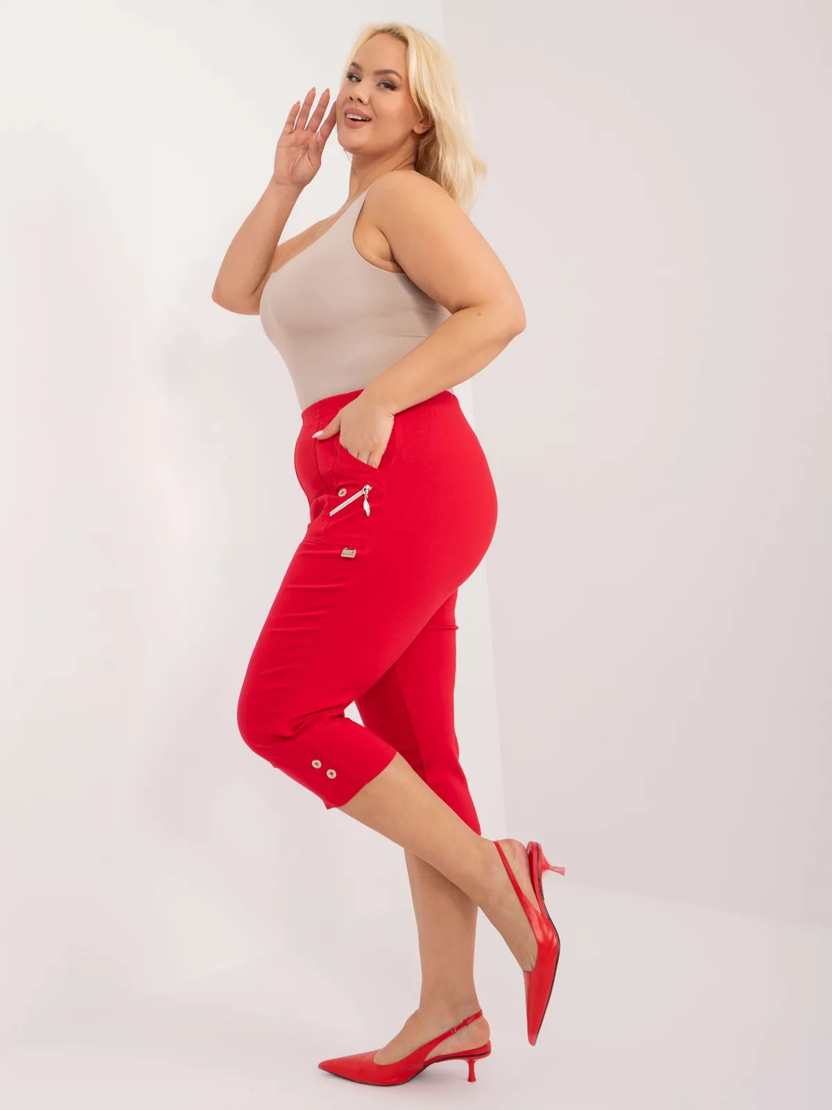 Wygodne spodnie rybaczki z ozdobnymi suwakami - zdjęcie 1