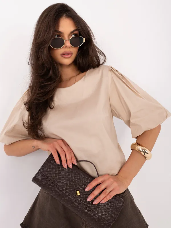Elegancka bluzka z bufiastymi rękawami i zapięciem