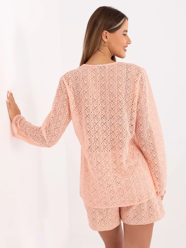 Komplet plażowy z ażurową bluzką wiązaną sznurkami