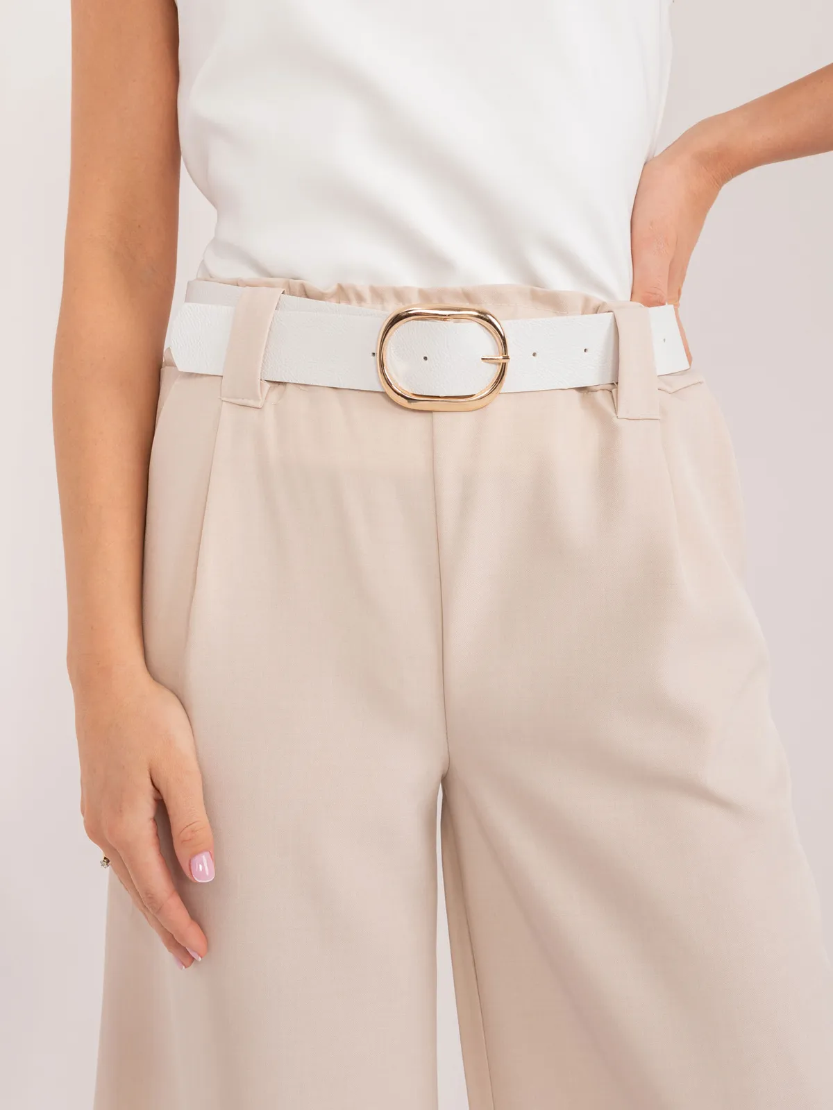 Eleganckie spodnie z szerokimi nogawkami i paskiem - zdjęcie 1