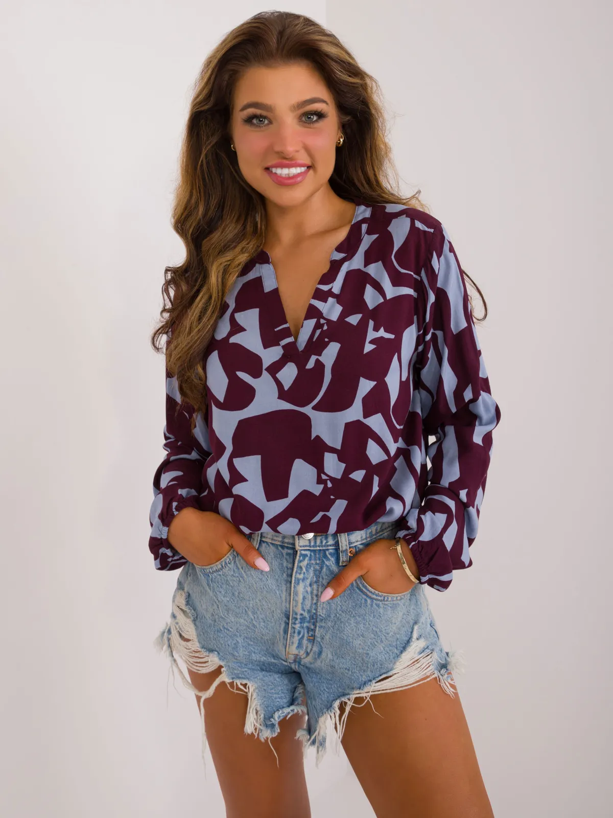 Luźna bluzka oversize z geometrycznym wzorem - zdjęcie 1