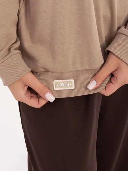 Bluza oversize z ozdobnym wiązaniem przy dekolcie