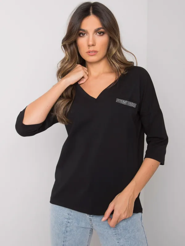 Casualowa bluzka oversize z dekoracyjną kieszonką