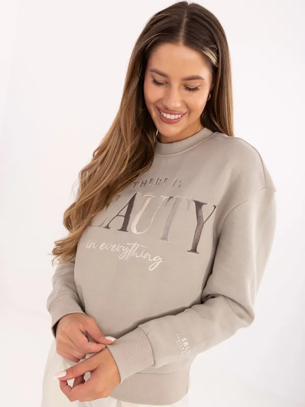Bluza oversize z ozdobnym napisem i ściągaczami - widok 2