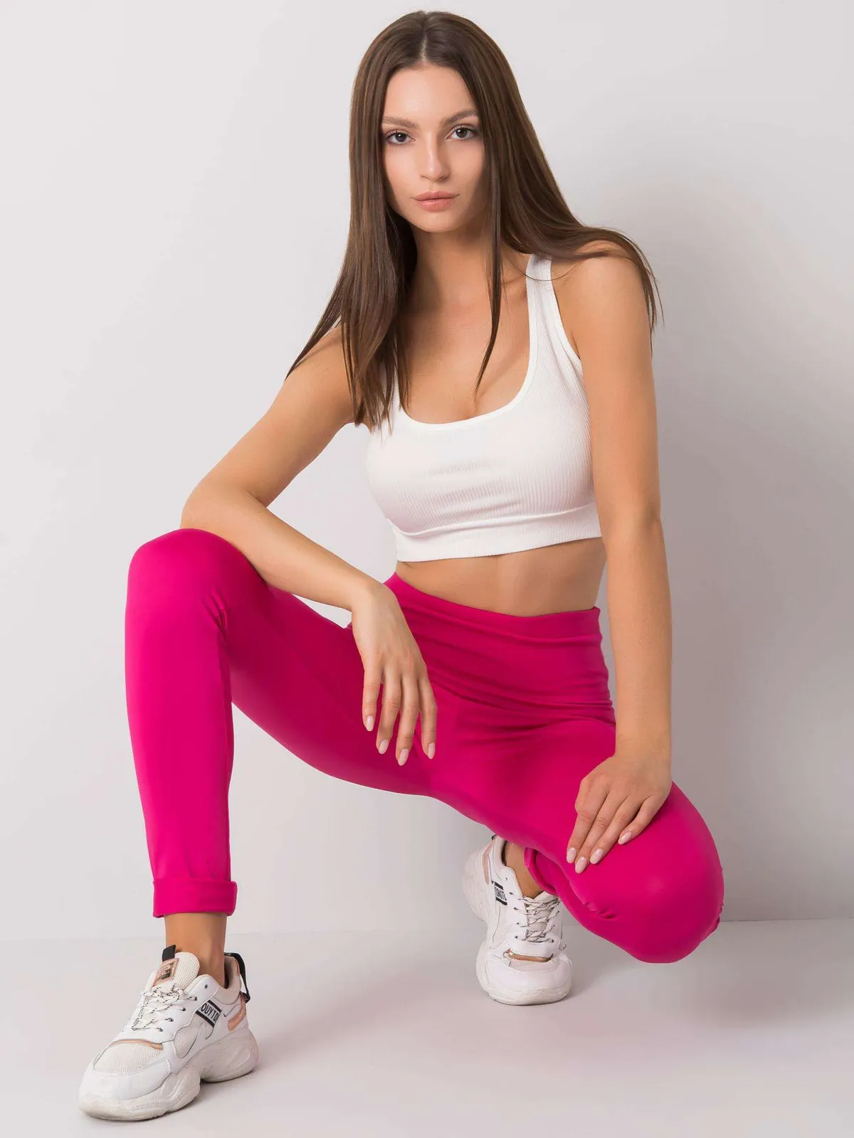 Fluo pomarańczowe legginsy sportowe damskie - zdjęcie 3