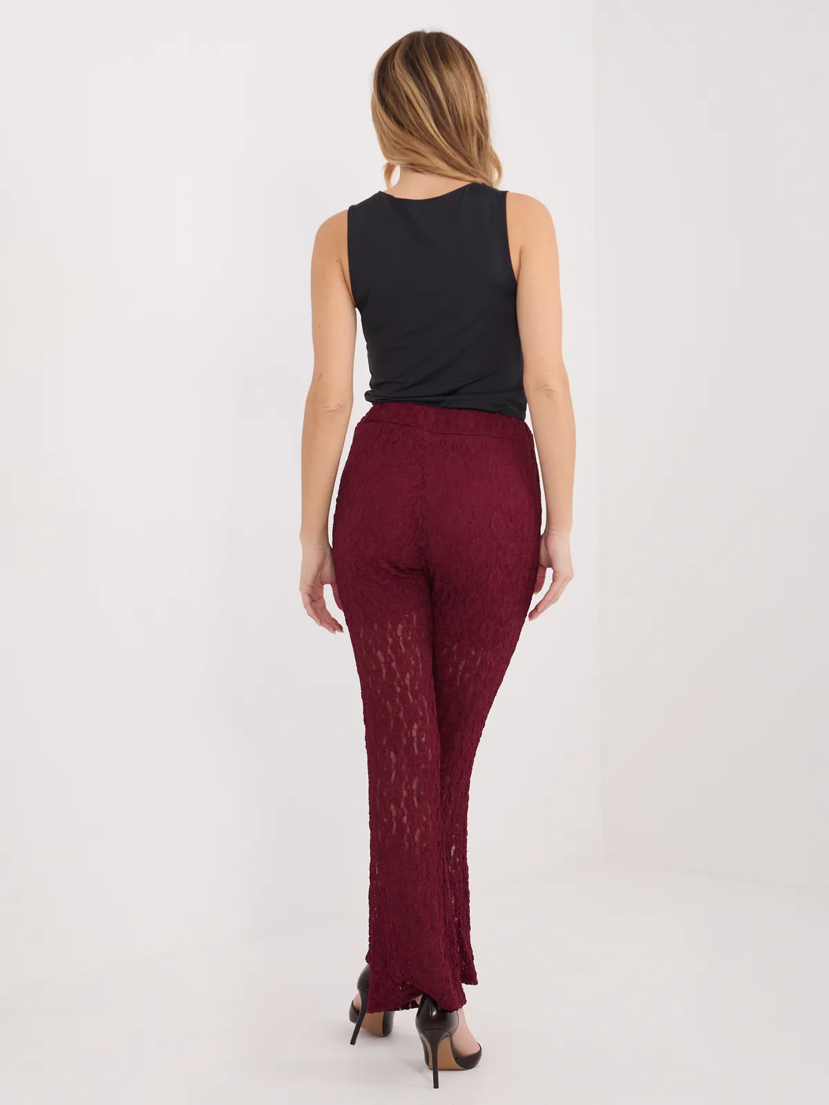 Dopasowane spodnie z wysokim stanem i nogawkami dzwonami - zdjęcie 1