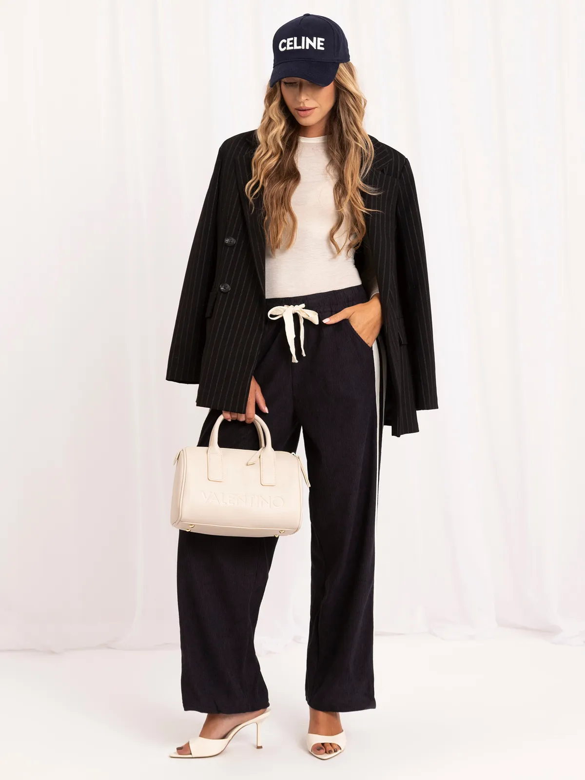 Casualowe spodnie typu wide leg z lampasami - zdjęcie 4