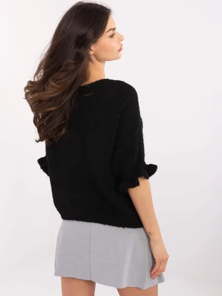 Sweter oversize z rękawami wykończonymi falbaną