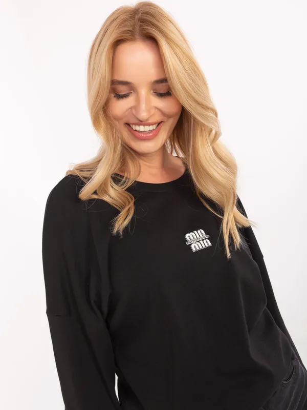 Casualowa bluzka oversize z obniżoną linią ramion